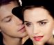 Emma Watson, sur des clichés extraits de la vidéo making-of de la publicité Midnight Rose