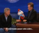 Harrison Ford, invité de l'émission de Connan O'Brien, sur TBS, le 1er août 2011. Mécontent du box-office, il s'en prend au Grand Schtroumpf.  