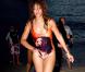 Rihanna en vacances à La Barbade, le 6 août 2011. Sur son maillot, son idole : Bob Marley.