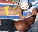 Cameron Diaz bien installée au soleil en compagnie de son boyfriend Alex Rodriguez, à Miami. Août 2011