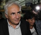 Dominique Strauss-Kahn et Anne Sinclair à l'aéroport JFK, le 3 septembre 2011.