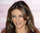 Elizabeth Hurley, engagée, lors de l'événement organisé par Estée Lauder pour promouvoir le mois de sensibilisation au cancer du sein, à Londres, le 29 septembre 2011