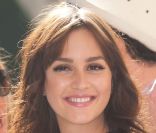 Leighton Meester, pétillante à son arrivée au défilé Dior le 30 septembre 2011 au musée Rodin à Paris