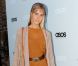Isabel Lucas arrive lookée à la soirée de lancement du site de shopping en ligne ASOS en Australie. Sydney, 11 octobre 2011