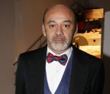Christian Louboutin au dîner de charité parisien organisé au profit des enfants du Rwanda. Le 10 décembre 2011