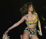 Selon le magazine <em>Forbes</em>, Rihanna a gagné 29 millions de dollars cette année. Ici photographiée à Milan, le 13 decembre 2011.