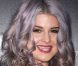 Kelly Osbourne, élégante et sobre dans une robe blanche à Los Angeles, le 23 janvier 2012.