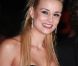 Elodie Gossuin sur le tapis rouge des 13e NRJ Music Awards, le 28 janvier 2012 à Cannes. Malgré une météo peu clémente et quelques gouttes, les invitées de l'événement ont offert un spectaculaire défilé.