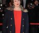 Anne Roumanoff sur le tapis rouge des 13e NRJ Music Awards, le 28 janvier 2012 à Cannes. Malgré une météo peu clémente et quelques gouttes, les invitées de l'événement ont offert un spectaculaire défilé.