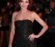Claire Keim sur le tapis rouge des 13e NRJ Music Awards, le 28 janvier 2012 à Cannes. Malgré une météo peu clémente et quelques gouttes, les invitées de l'événement ont offert un spectaculaire défilé.