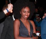 Inna Modja sur le tapis rouge des 13e NRJ Music Awards, le 28 janvier 2012 à Cannes. Malgré une météo peu clémente et quelques gouttes, les invitées de l'événement ont offert un spectaculaire défilé.