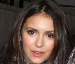 L'actrice Nina Dobrev quitte le défilé Hervé Léger by Max Azria à New York, le 11 février 2012.