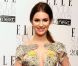 Tali Lennox effectue des premiers pas réussis sur le tapis rouge des Elle Style Awards 2012 avec cette création Julia Macdonald. Londres, le 13 février 2012.