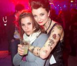Séverine Morisseau, responsable relations presse de MHD (Moët Hennessy Diageo), et sa fancy farandole de tattoos lors de la folle nuit de l'éphémère Crazy Club de J&B, au coeur du Jardin des Tuileries, à Paris, le 8 février 2012. Après la Chromatic Night en 2010 et l'Excentric Night en 2011, la marque de whisky organisait une Crazy Night pleine de couleurs.