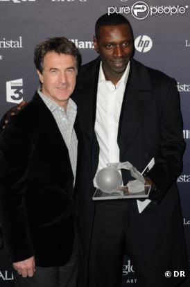 François Cluzet et Omar Sy lors des Globes de cristal le 6 février 2012 