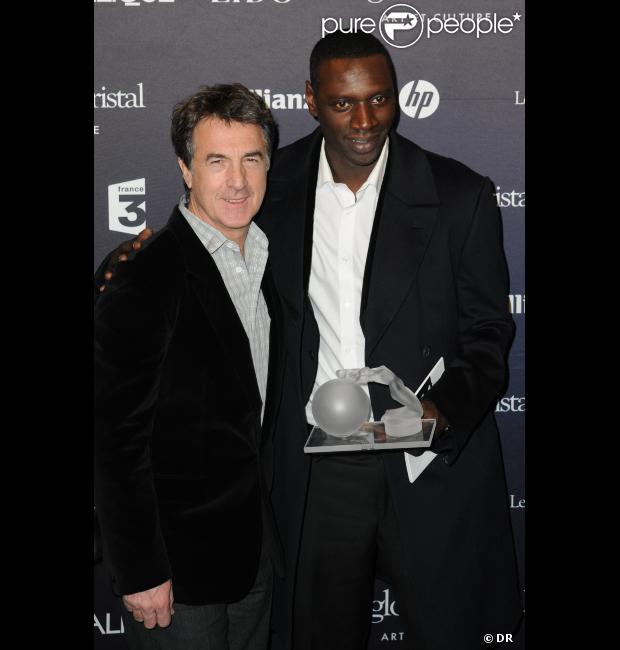 François Cluzet et Omar Sy lors des Globes de cristal le 6 février 2012 