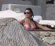 Lea Michel profite des joies de la baignade pendant ses vacances au Mexique. Février 2012
