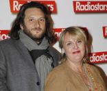 Valérie Damidot et son compagnon Régis à l\'avant-première de Radiostars, le 2 avril 2012 à l\'UGC Normandie à Paris