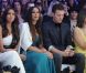 Leona Lewis et son petit ami Dennis Jauch, complètement distrait par son téléphone, assistent au défilé Ariella Couture à Londres. Le 17 avril 2012.