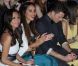 Leona Lewis et son petit ami Dennis Jauch, complètement distrait par son téléphone, assistent au défilé Ariella Couture à Londres. Le 17 avril 2012.