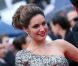 Kelly Brook lors de la montée des marches le 21 mai 2012 dans le cadre du Festival de Cannes lors de la présentation du film d'Alain Resnais Vous n'avez encore rien vu