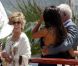 Jean-Paul Belmondo et Barbara Gandolfi croisent Jane Fonda au déjeuner organisé par  Paris Match  à l'Eden Roc, au Cap d'Antibes, le 17 mai 2012.