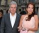 Anouchka Delon, au bras de son père Alain Delon, assiste au défilé Croisière 2013 de Salvatore Ferragamo à la Galerie Denon au Louvre. Paris, le 12 juin 2012.