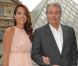 Alain et Anouchka Delon, un duo père-fille stylé pour assister au défilé Croisière 2013 de Salvatore Ferragamo à la Galerie Denon au Louvre. Paris, le 12 juin 2012.