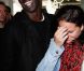 Omar et Hélène Sy lors de la vente aux enchères des toiles de Florence Cassez, à Paris, le 16 juin 2012.