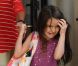 Grimace matinale pour Suri Cruise avec sa mère Katie Holmes. New York le 22 juin 2012.