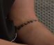 Justin Bieber expose son tatouage sur le plateau du  David Letterman Show , le jeudi 21 juin 2012.
