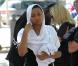 Sa fille aînée Tessa aux obsèques de son père Mouss Diouf, le 9 juillet 2012, à Auriol.