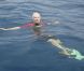 Richard Branson comme un poisson dans l'eau avant d'aller nager avec les requins-baleines au large des îles Mujeres le 9 juillet 2012