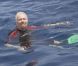 Richard Branson nage avec les requins-baleines au large des îles Mujeres  le 9 juillet 2012