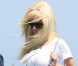  Zahia Dehar arrive sur la plage du Club 55 à Saint-Tropez le 26 juillet 2012 