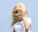  Zahia Dehar arrive sur la plage du Club 55 à Saint-Tropez le 26 juillet 2012 