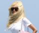  Zahia Dehar arrive cheveux au vent telle une vraie star sur la plage du Club 55 à Saint-Tropez le 26 juillet 2012 