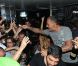 Christian Audigier en grande forme au VIP Room de Jean-Roch, le samedi 28 juillet 2012. Le styliste, d'humeur partageuse, a acheté 500 bouteilles de champagne pour les offrir aux clubbers !