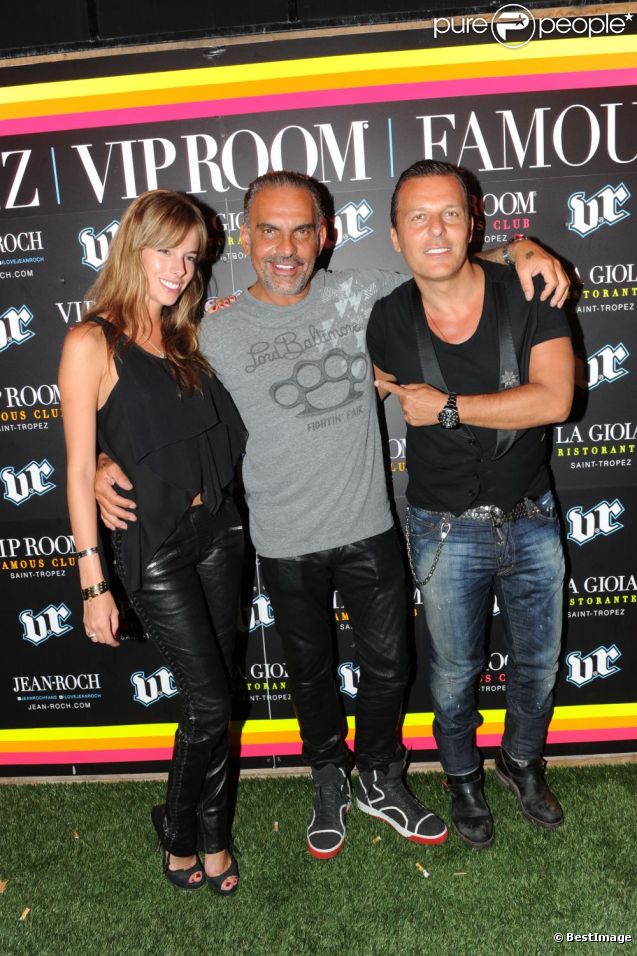Christian Audigier et sa douce Nathalie font la fête au VIP Room de Jean-Roch, le samedi 28 juillet 2012. Le styliste y lançait sa marque Lady Baltimore.