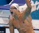 Florent Manaudou devient champion olympique du 50m nage libre sous les yeux de sa soeur Laure, en larmes, le 3 août 2012 à Londres