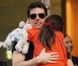 Suri Cruise dans les bras de son père Tom Cruise à New York le 17 juillet 2012