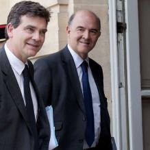 Arnaud Montebourg, ministre du Redressement productif, et Pierre Moscovici, ministre de l'Économie et des Finances, au palais de l'Elysée, le 25 juin 2012. à Paris, le 9 octobre 2011.