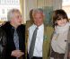 Le photographe Jean-Marie Périer entouré de sa demi-soeur Anne-Marie Périer et Michel Sardou, à Paris, le 8 février 2012.