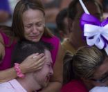 Des membres de la famille des victimes de la tuerie à Aurora, le 22 juillet 2012.
