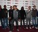 Les joueurs du PSG Handball, Didier Dinart en première ligne, lors de la soirée de lancement FIFA 13, le 25 septembre 2012 à l'Olympia de Paris.