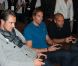Camille Lacourt en pleine partie lors de la soirée de lancement FIFA 13, le 25 septembre 2012 à l'Olympia de Paris.