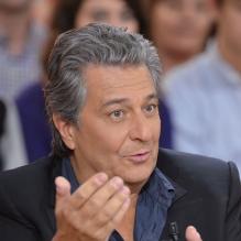 <p>Christian Clavier sur le tournage de <em>Vivement Dimanche</em>, le 30 octobre 2010.</p>