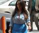  Kim Kardashian en octobre 2012 à Miami dévoile et assume une silhouette plus voluptueuse.  