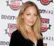 Nicole Richie, habillée d'une robe noire Winter Kate et de souliers Christian Louboutin, arrive pour son séminaire à la Teen Vogue Fashion University. New York, le 20 octobre 2012.