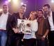 Baptiste Giabiconi pose avec son Disque d'or au Divan du Monde à Paris le 22 octobre 2012.